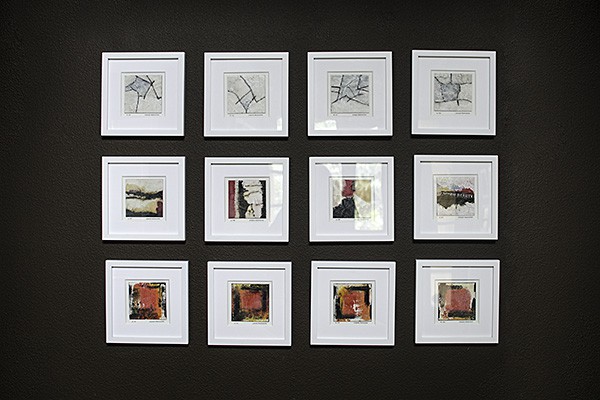 a grid display of mini encaustic paintings